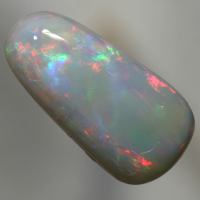 SOLID SEMI BLACK OPAL High dome, red to magenta to green and purple